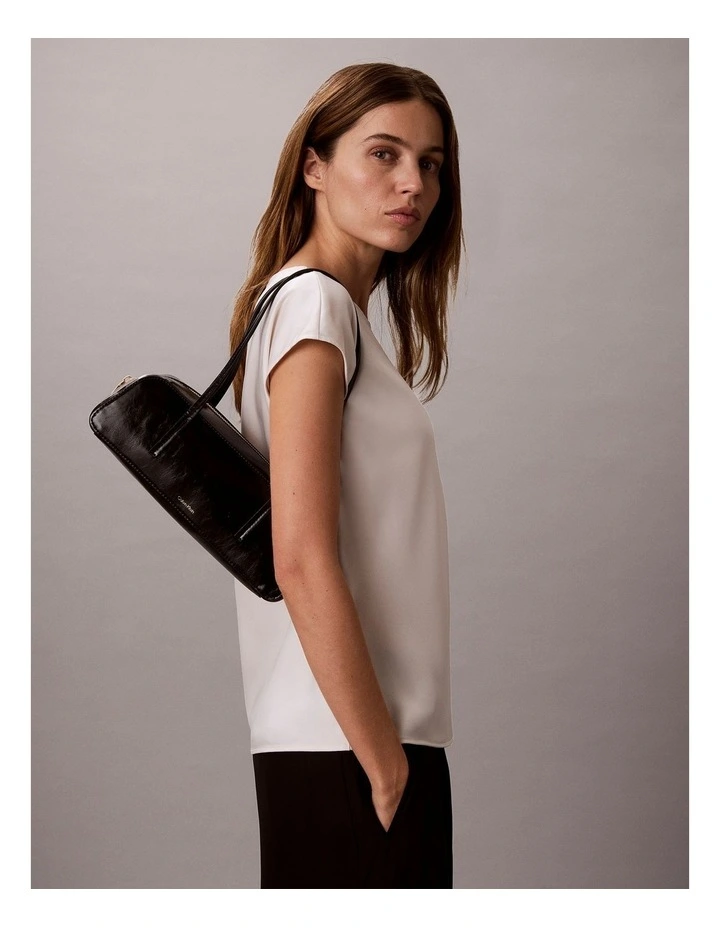 Glossy Embossed Logo Bauletto Shoulder Bag in Black image 5