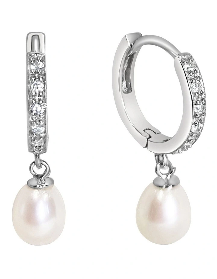 Pearl Huggie Earrings in White image 1