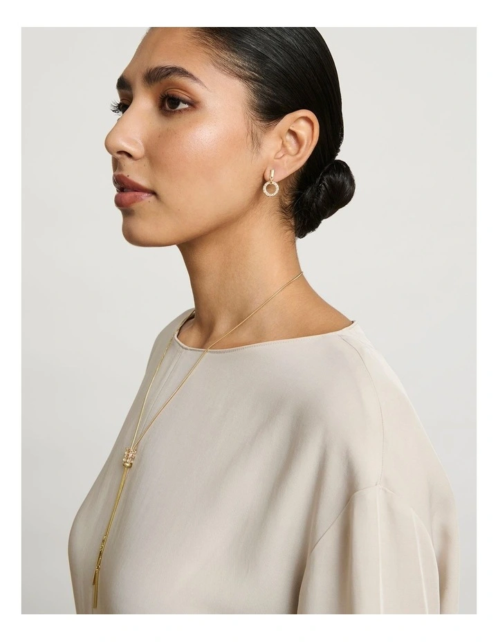 Dainty Circle Drop Earrings in Gold image 3