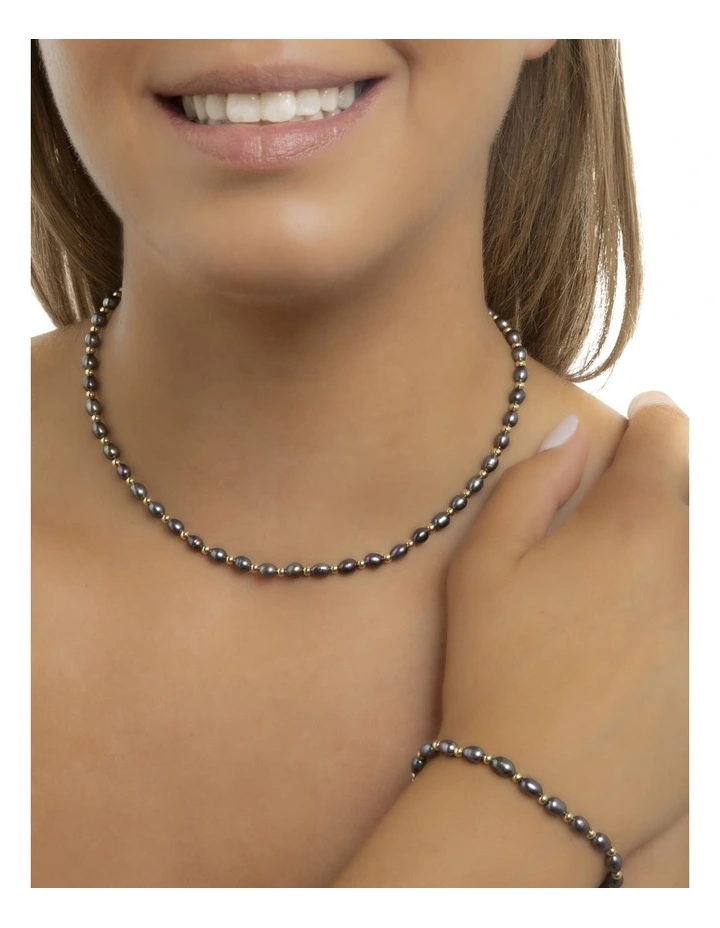 Iridescent Peacock Pearl Bracelet in Black image 2
