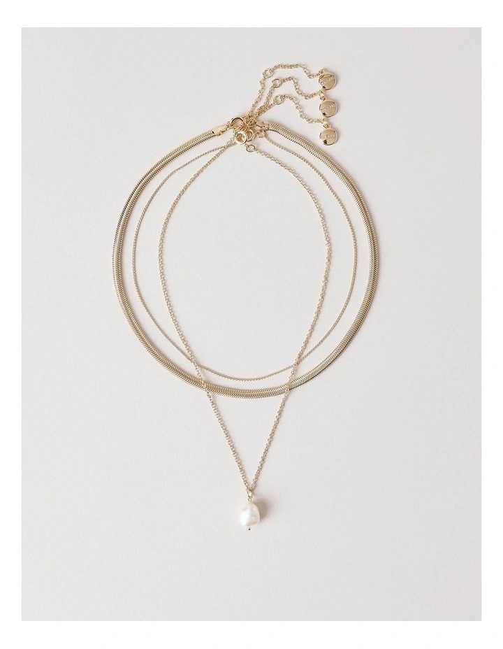 Layered Pearl Necklaces in Gold image 1