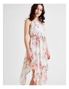 Audrey Sleeveless Woven Dress with Hankerchief Hem and Floral Print in Vanilla