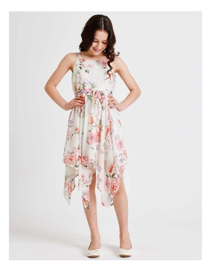 Audrey Sleeveless Woven Dress with Hankerchief Hem and Floral Print in Vanilla image 2