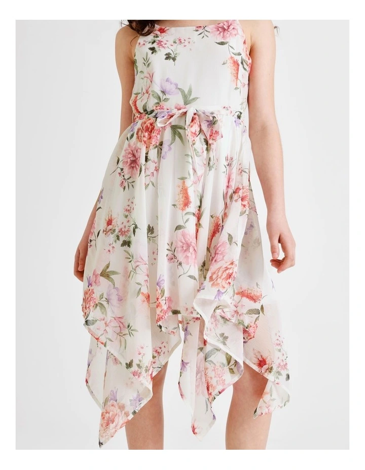 Audrey Sleeveless Woven Dress with Hankerchief Hem and Floral Print in Vanilla image 5