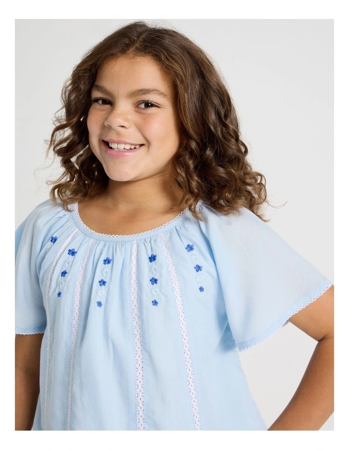 Loose Fit Top with Embroidery and Lace Inserts in Light Blue image 3