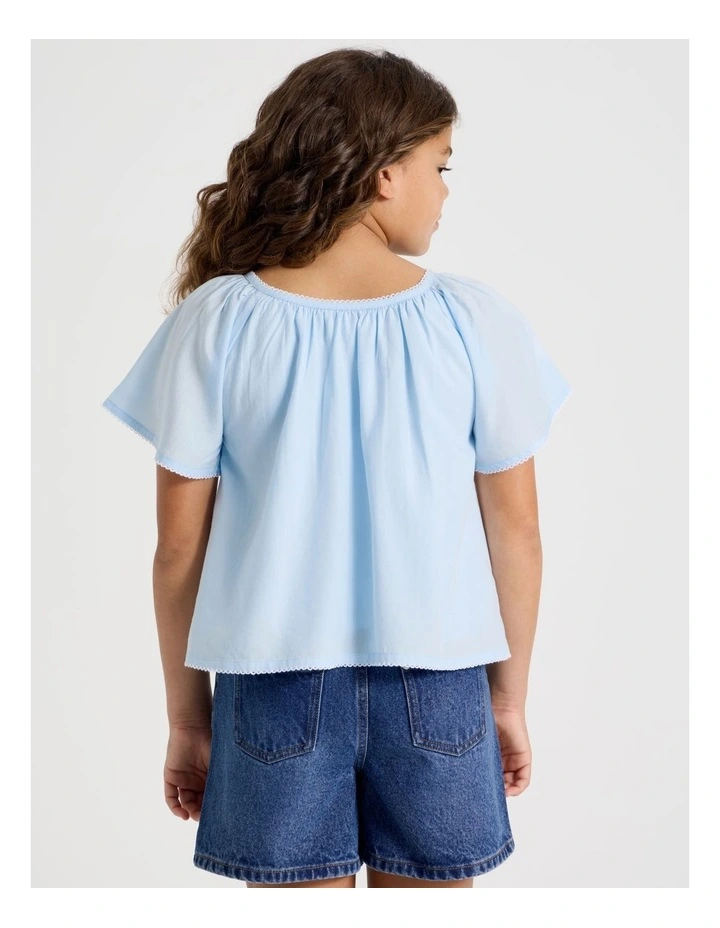 Loose Fit Top with Embroidery and Lace Inserts in Light Blue image 5