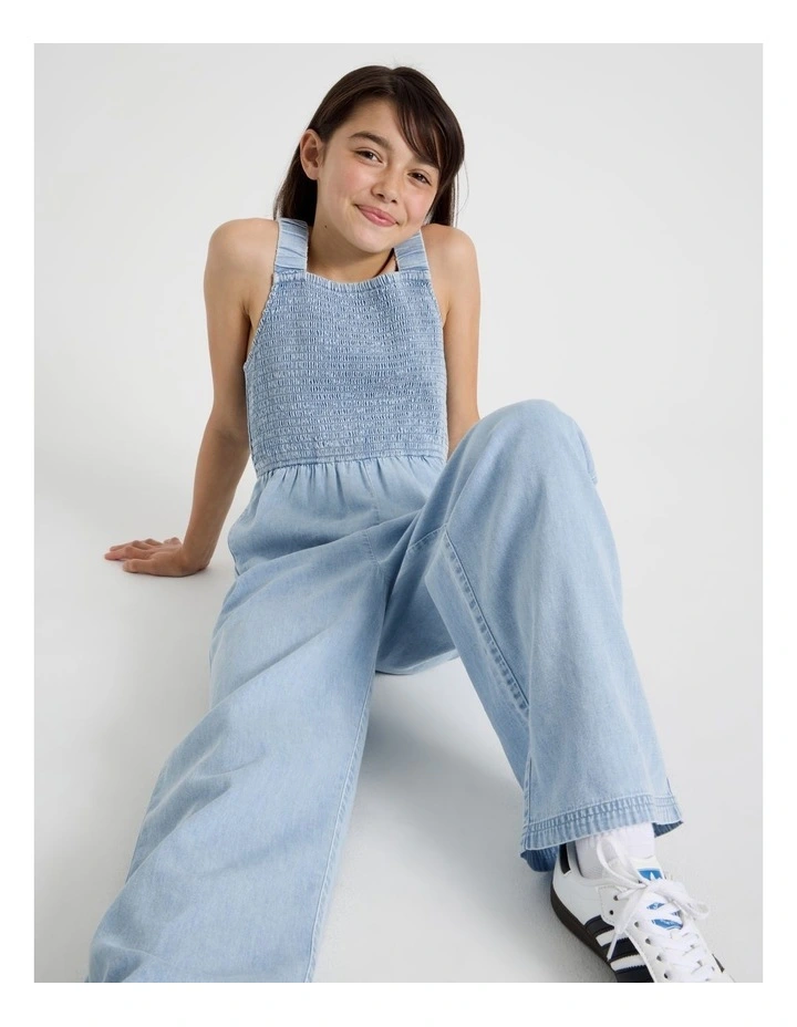 Denim Shirred Bodice Jumpsuit with Embroidery Hem in Denim image 1