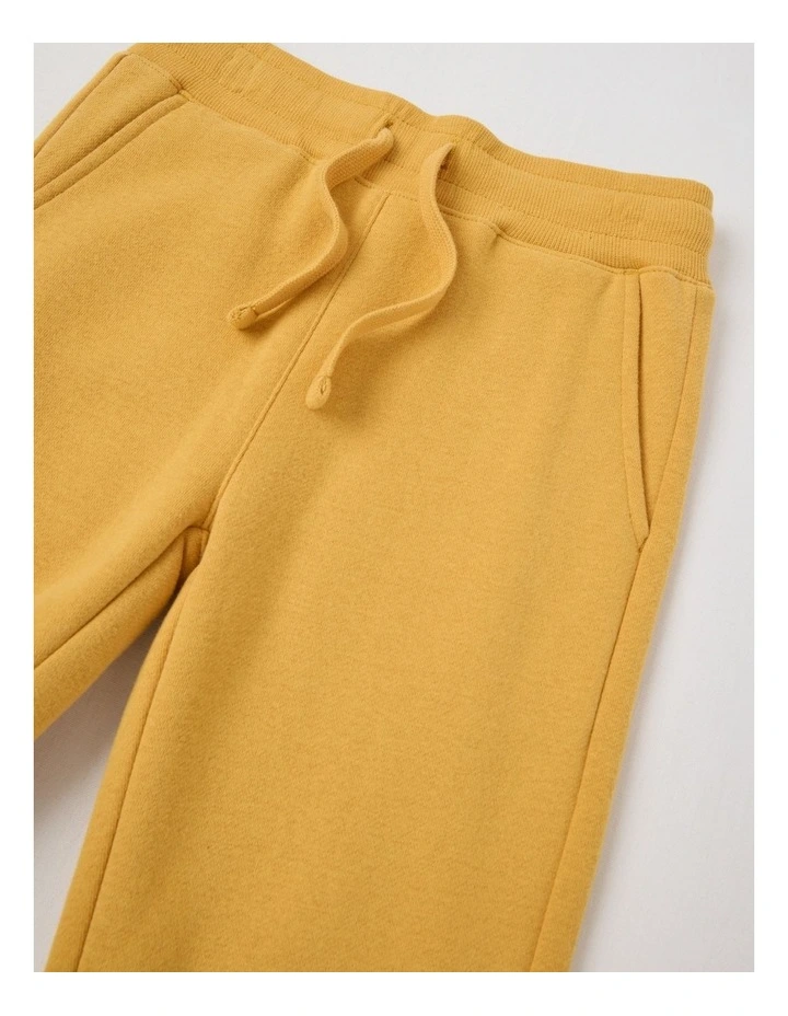 Essentials Trackpant in Mustard image 2