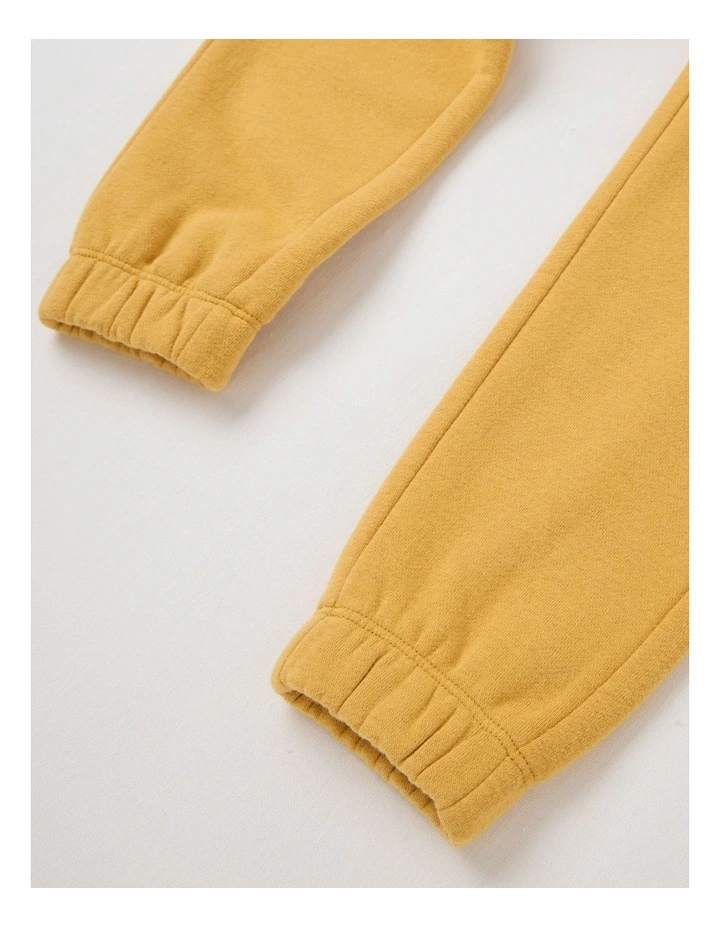 Essentials Trackpant in Mustard image 4