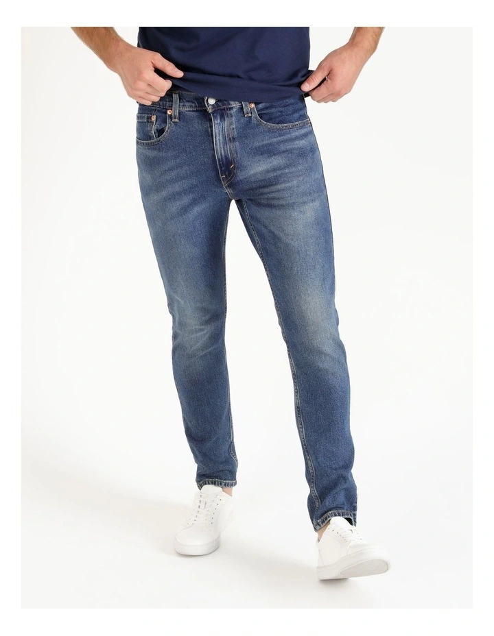 512 Tapered Slim Fit Jeans in Mid Blues image 1