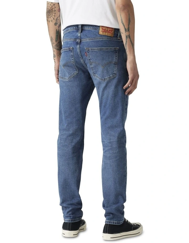 512 Tapered Slim Fit Jeans in Mid Blues image 2