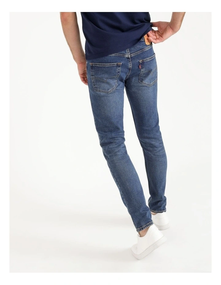 512 Tapered Slim Fit Jeans in Mid Blues image 3