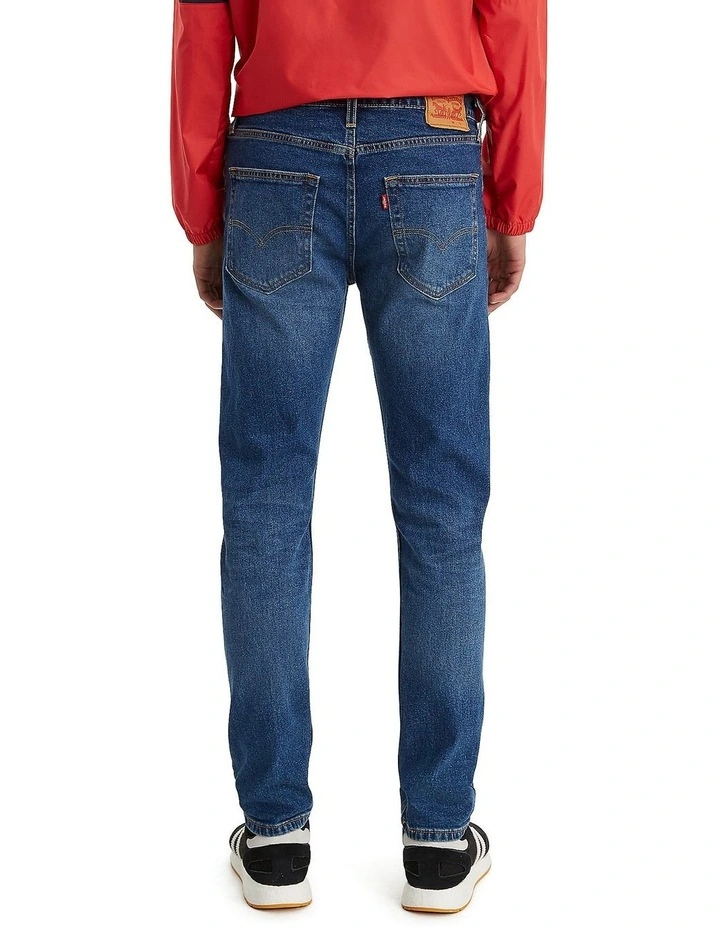 512 Tapered Slim Fit Jeans in Mid Blues image 7