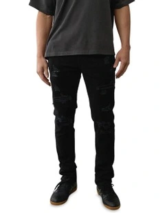 Air Flex+ Ripped Slim Jeans in Always Black
