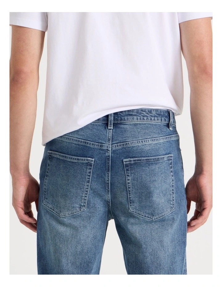 Long Regular Tapered Tinted Jeans in Mid Blues image 6