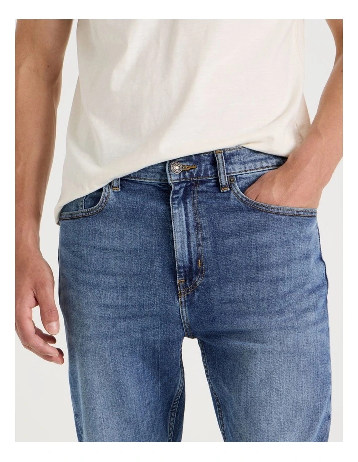 Slim Tapered Jeans in Mid Blues image 4