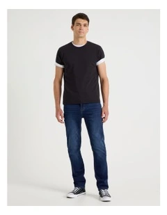 Slim Tapered Knit Jeans in Mid Blues