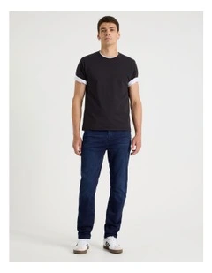 Slim Tapered Knit Jeans in Dark Denim
