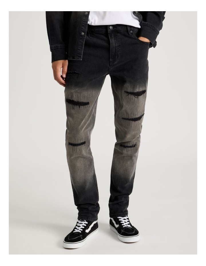 Rip & Repair Skinny Jeans in Black