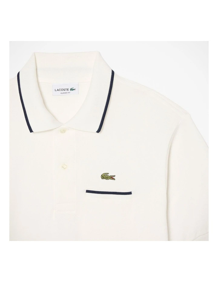 Core Essentials Regular Pique Polo Shirt Flour/Navy image 6