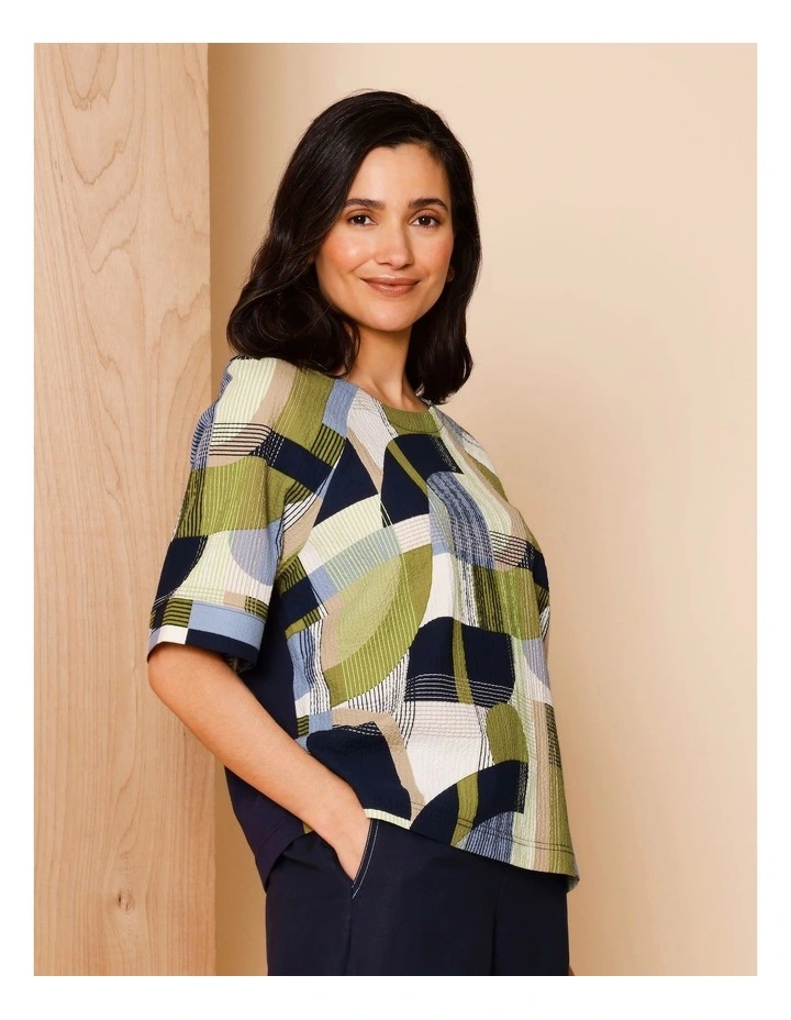 Raglan Short Sleeve Woven Front Tee With Knit Back In Navy/ Avocado/ White Geo Print image 1