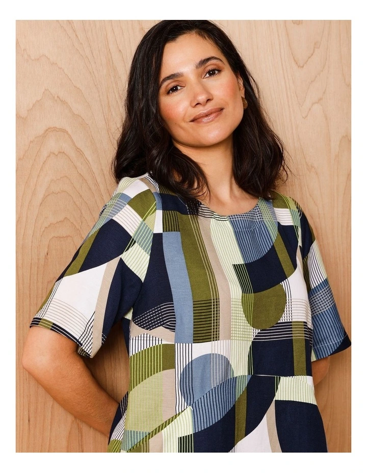 Short Sleeve Dress With Curved Waist And Pockets in Navy/ Ivory/ Avocado Geo image 2