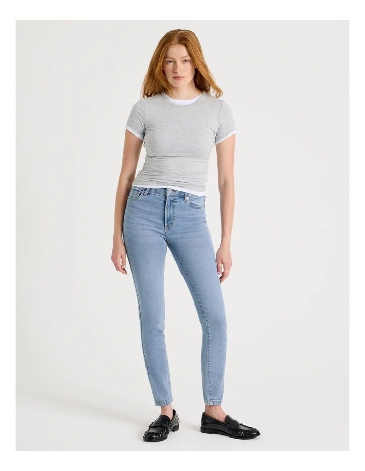 Skinny Mid Rise Jean in Light Indigo image 1