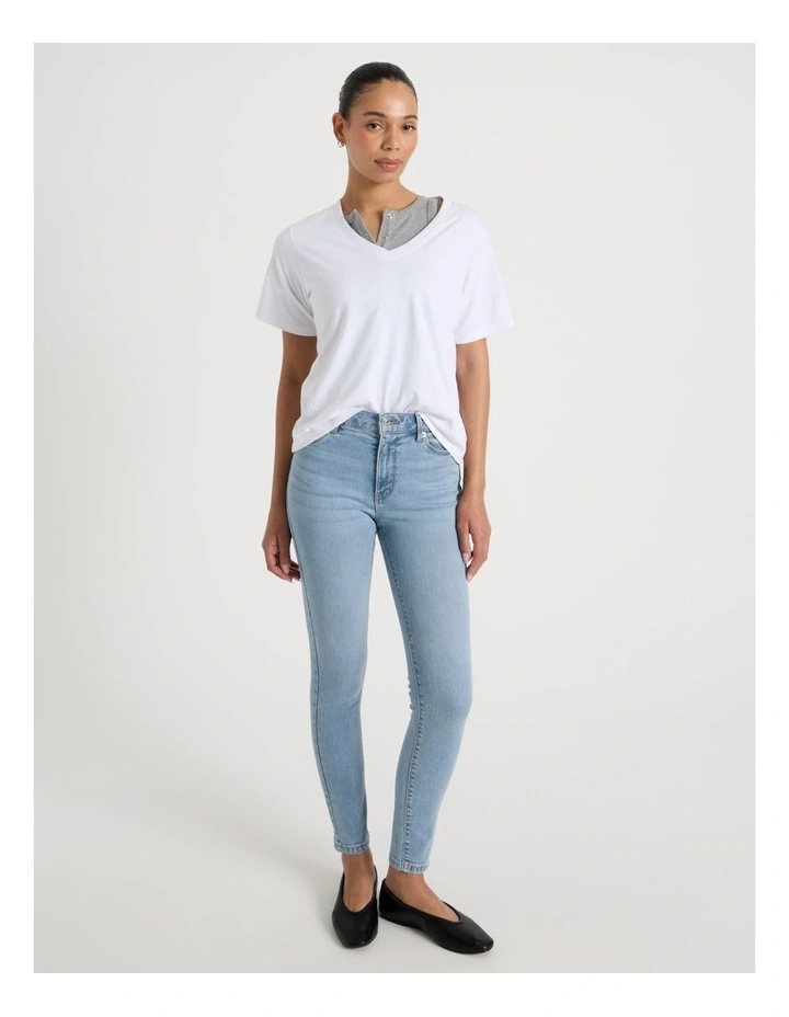 Skinny Mid Rise Jean in Light Indigo image 1