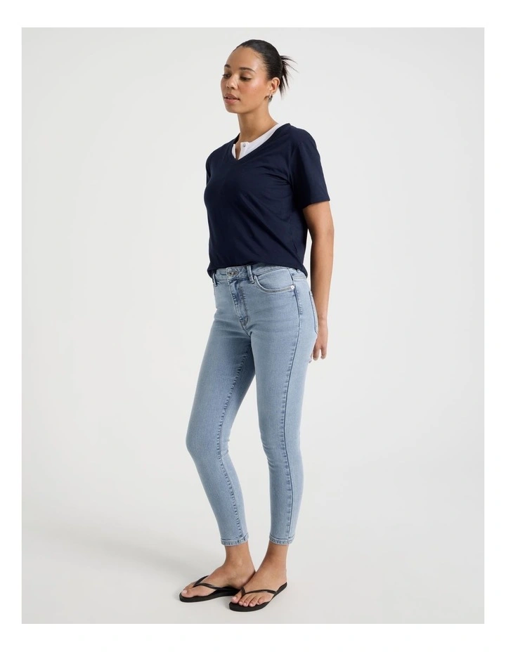 Skinny Mid Rise Jean With Short Inseam in Light Indigo image 4