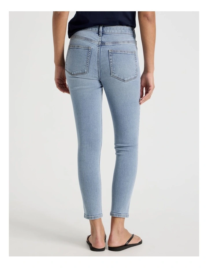 Skinny Mid Rise Jean With Short Inseam in Light Indigo image 6