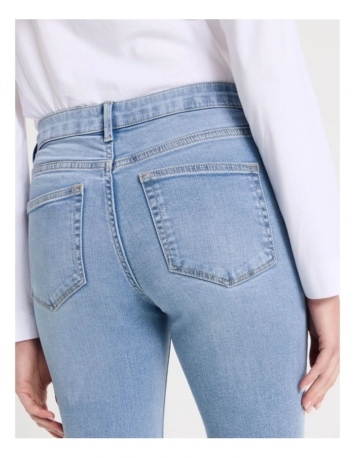 Skinny Mid Rise Jean with Short Inseam in Light Indigo image 6