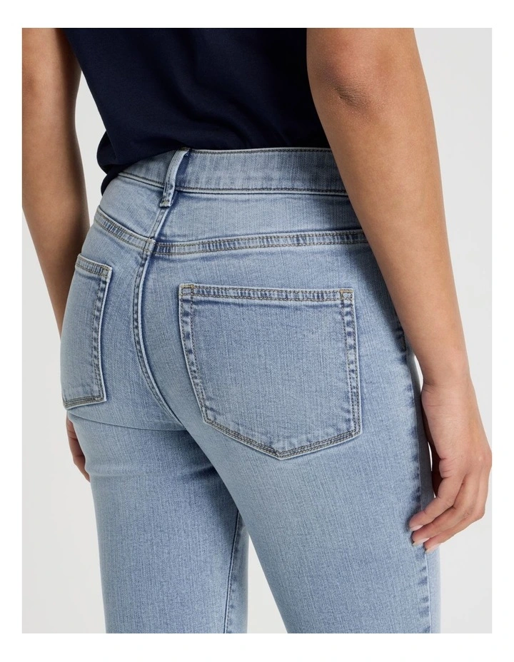 Skinny Mid Rise Jean With Short Inseam in Light Indigo image 7