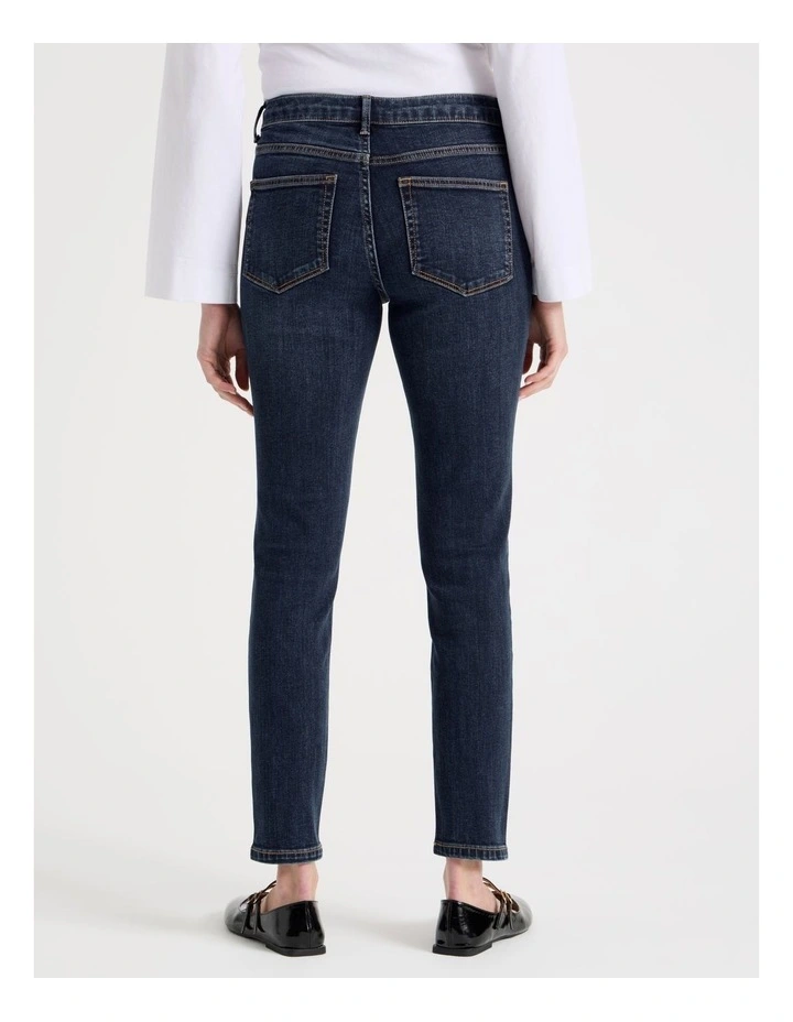 Skinny Mid Rise Jean with Short Inseam in Medium Indigo image 6