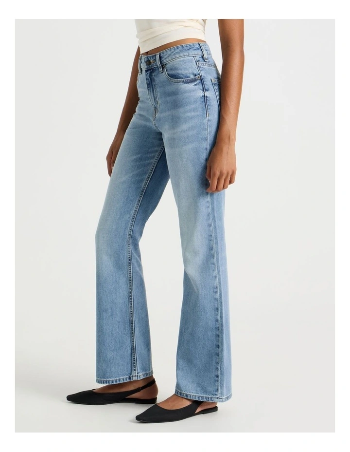 Flare High Rise Jeans in Medium Indigo image 3