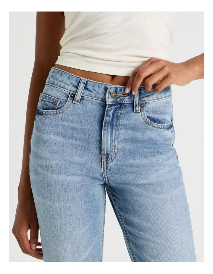 Flare High Rise Jeans in Medium Indigo image 4