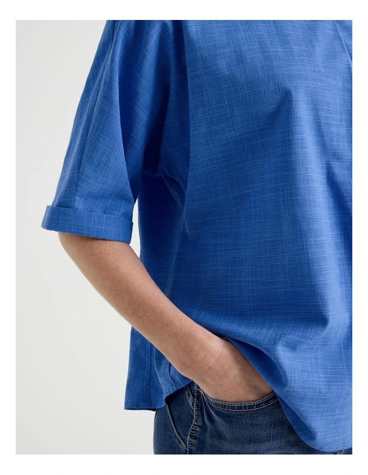 Extended Cuff Sleeve Top With Front Pleat & Button in Cobalt image 3