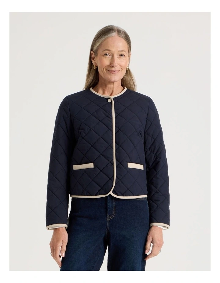 Short Collarless Puffer Jacket With Cord Trim in Navy image 5