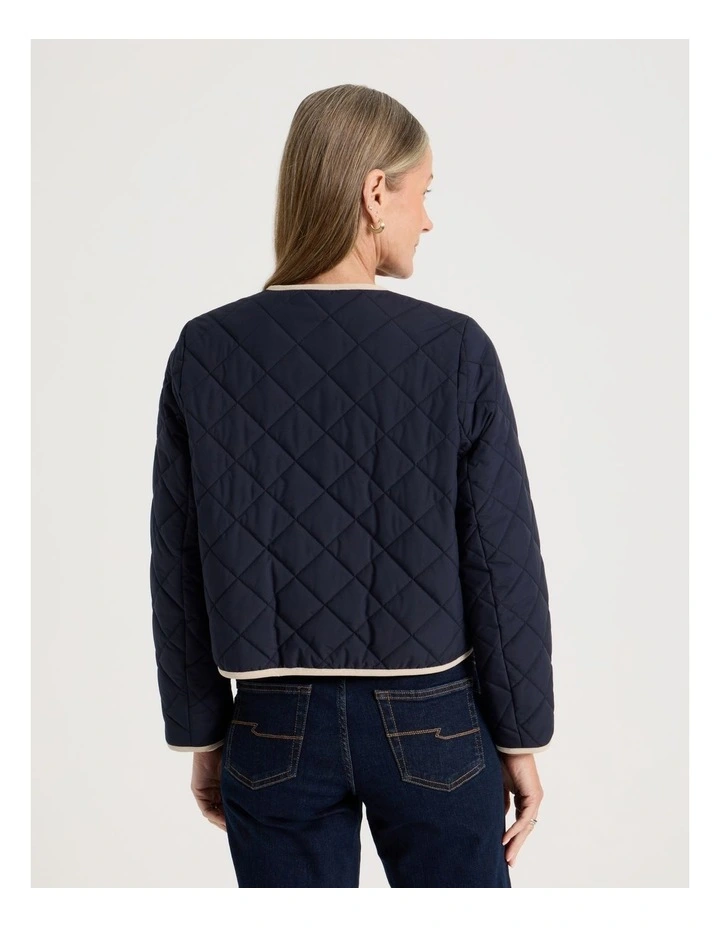 Short Collarless Puffer Jacket With Cord Trim in Navy image 6