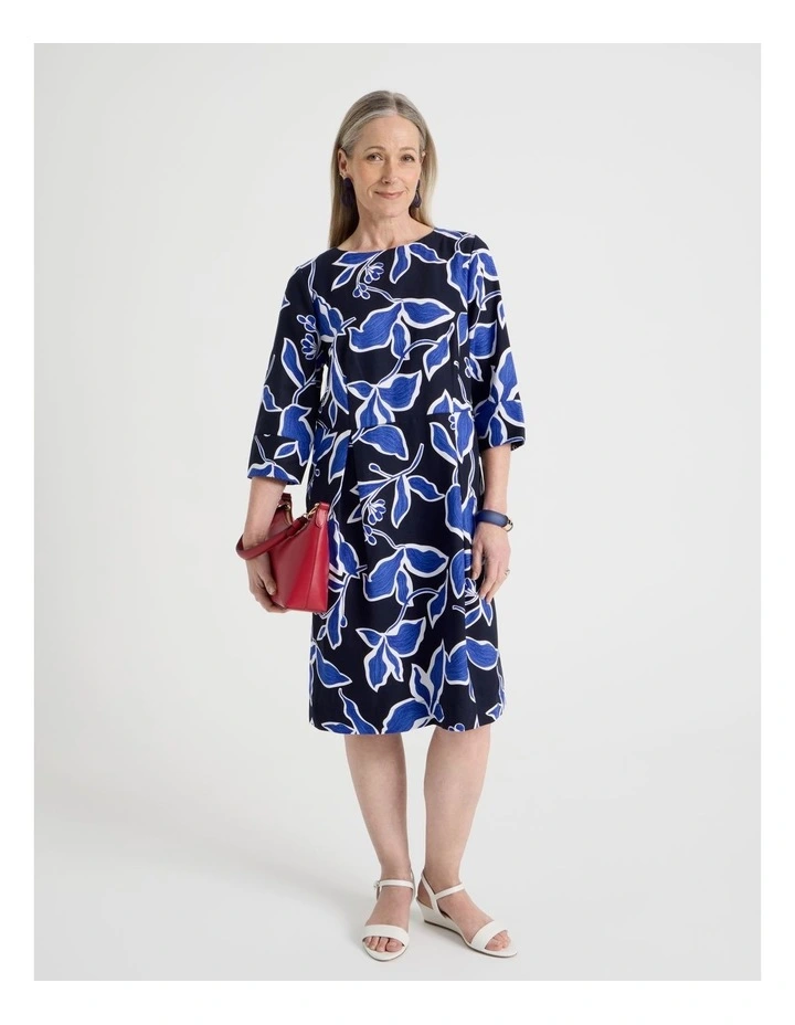 3/4 Sleeve Dress with Waist and Pleat Skirt in Navy and Cobalt Leaf Print image 1