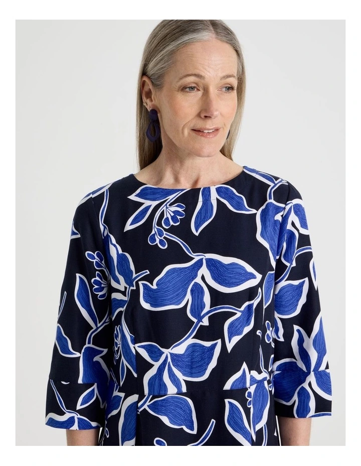 3/4 Sleeve Dress with Waist and Pleat Skirt in Navy and Cobalt Leaf Print image 3