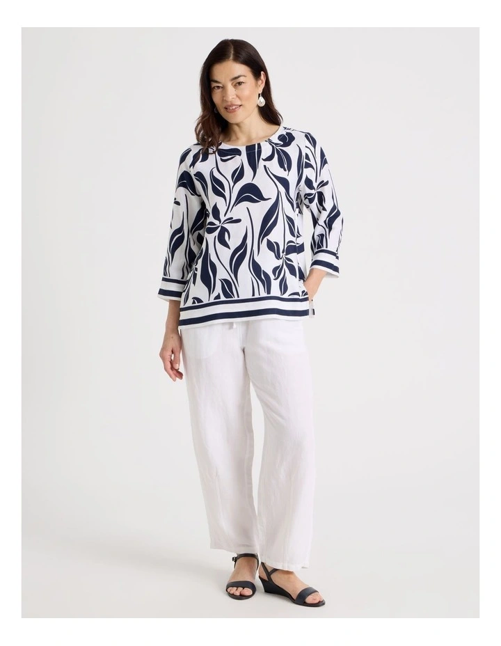 3/4 Sleeve Top With Side Vent And Stripe Trim in White/Navy Floral image 2