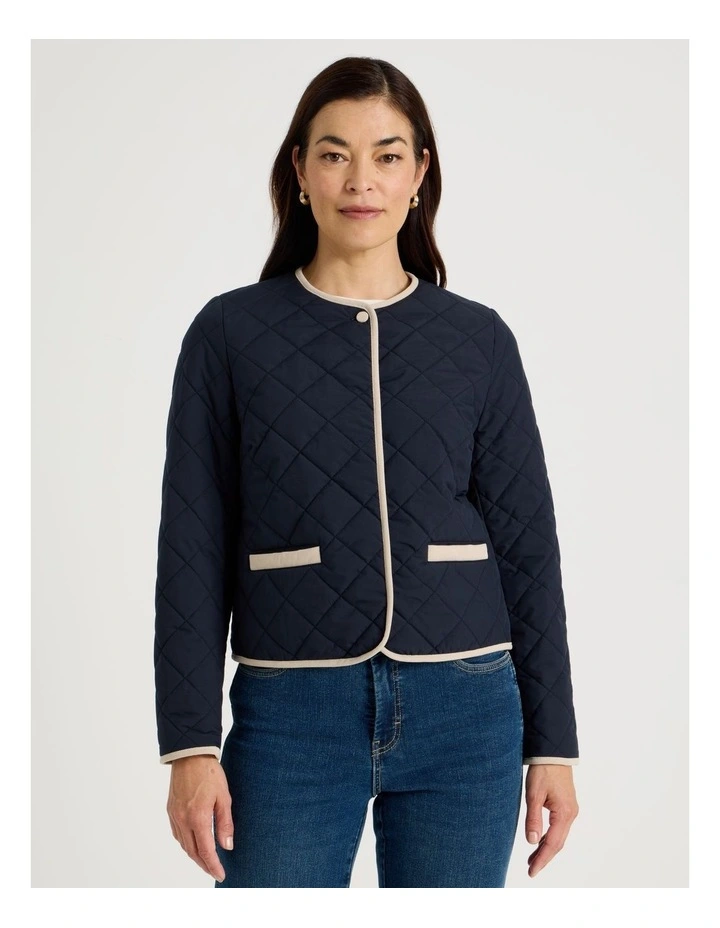 Short Collarless Puffer Jacket With Cord Trim in Navy image 3