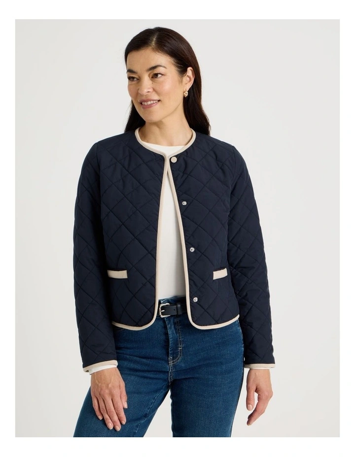 Short Collarless Puffer Jacket With Cord Trim in Navy image 5