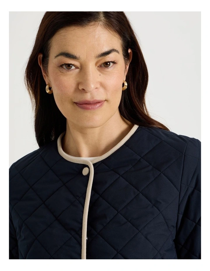 Short Collarless Puffer Jacket With Cord Trim in Navy image 7