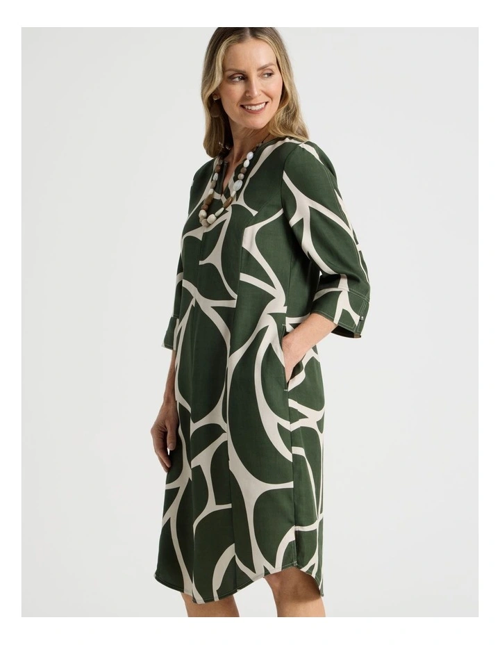 3/4 Sleeve Dress with Curved Hem and Centre Front Seam in Olive and Neutral Print image 2