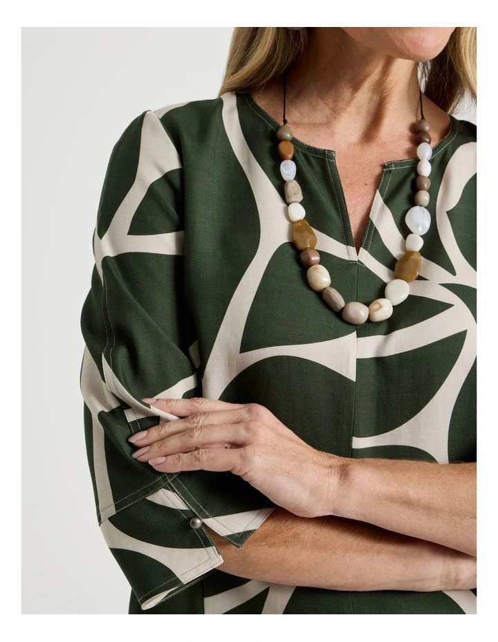 3/4 Sleeve Dress with Curved Hem and Centre Front Seam in Olive and Neutral Print image 3