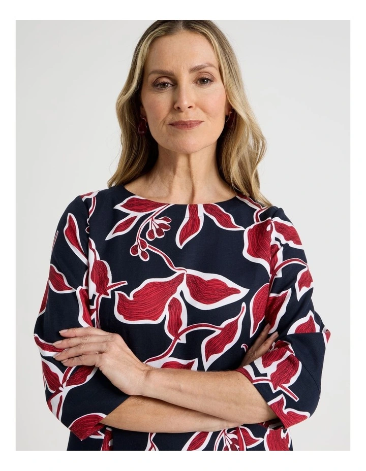 3/4 Sleeve Dress with Waist and Pleat Skirt in Navy and Red Leaf Print image 4