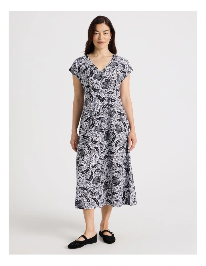 Extended Short Sleeve Knit Dress With Flared Skirt in Black/White Floral image 1