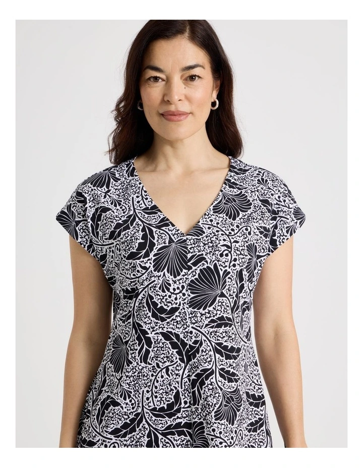 Extended Short Sleeve Knit Dress With Flared Skirt in Black/White Floral image 4