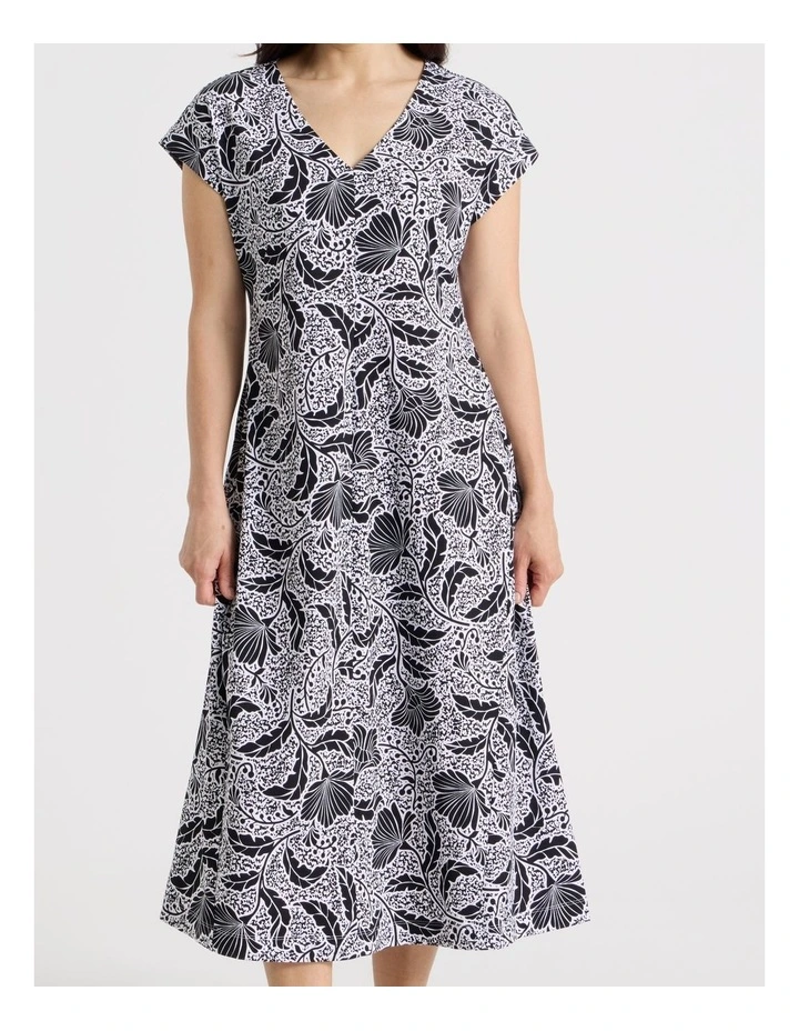 Extended Short Sleeve Knit Dress With Flared Skirt in Black/White Floral image 6